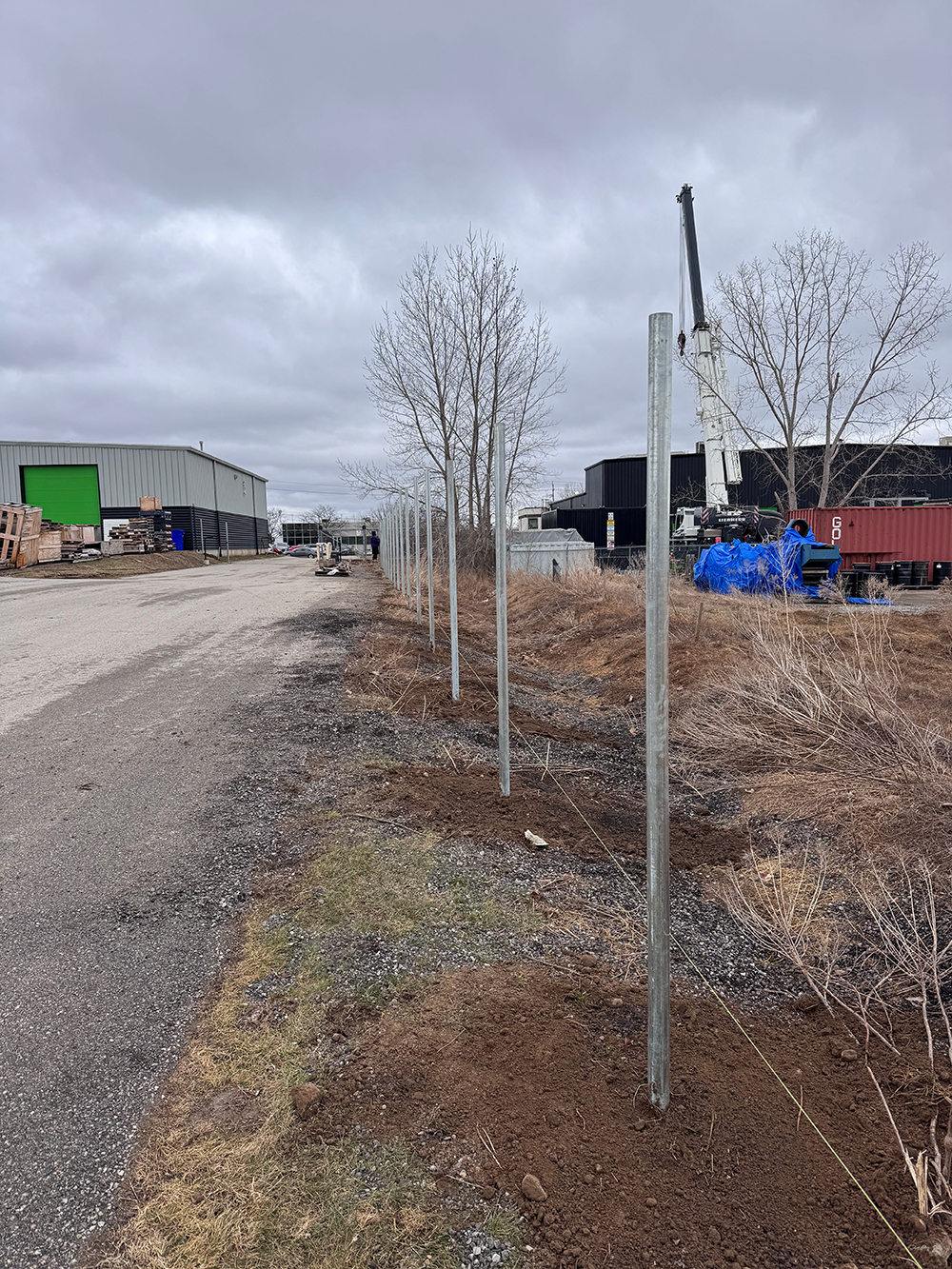 Professionally installed sonotube posts for commercial deck footing Cambridge Ontario construction